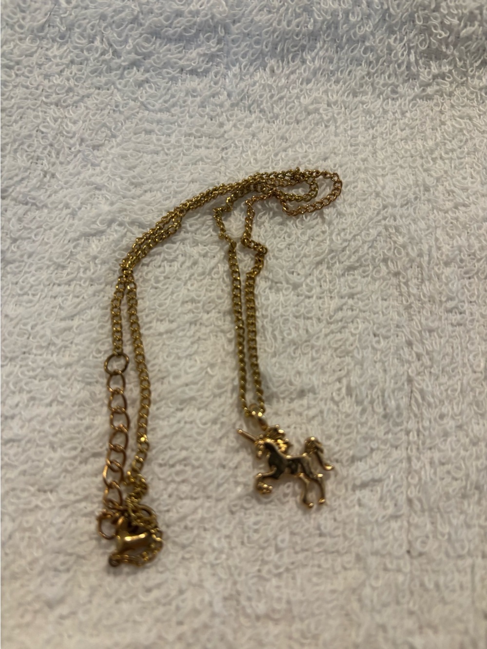 Gold tone unicorn necklace 18”